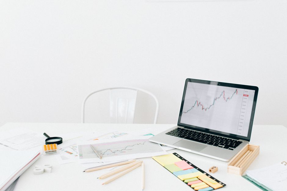 ROI spreadsheet dashboard on a laptop